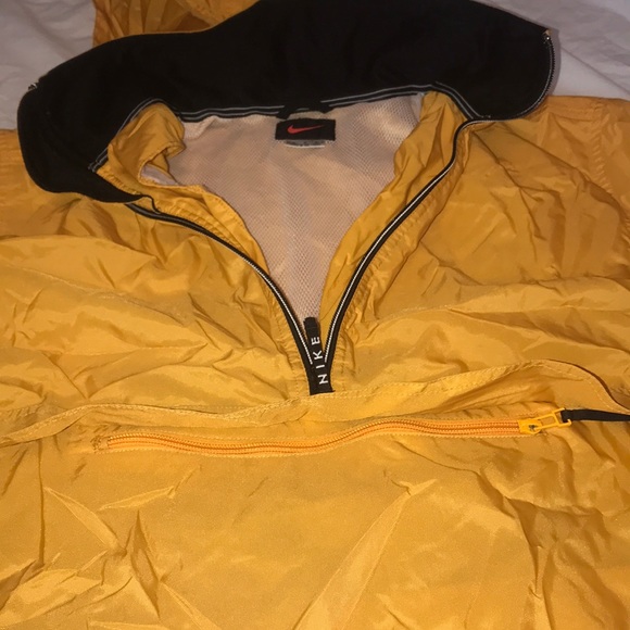 This is a yellow Nike windbreaker - Picture 3 of 5